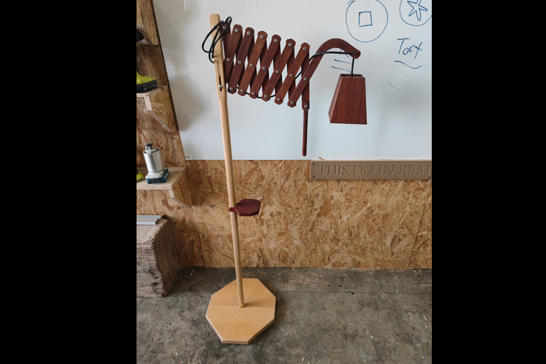 Uncommon Goods Singapore custom makes a lamp with Ramin and Cherry wood